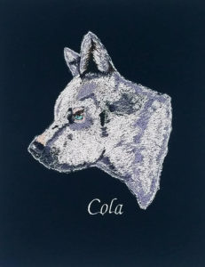 Embroidery portrait of a white cattle dog